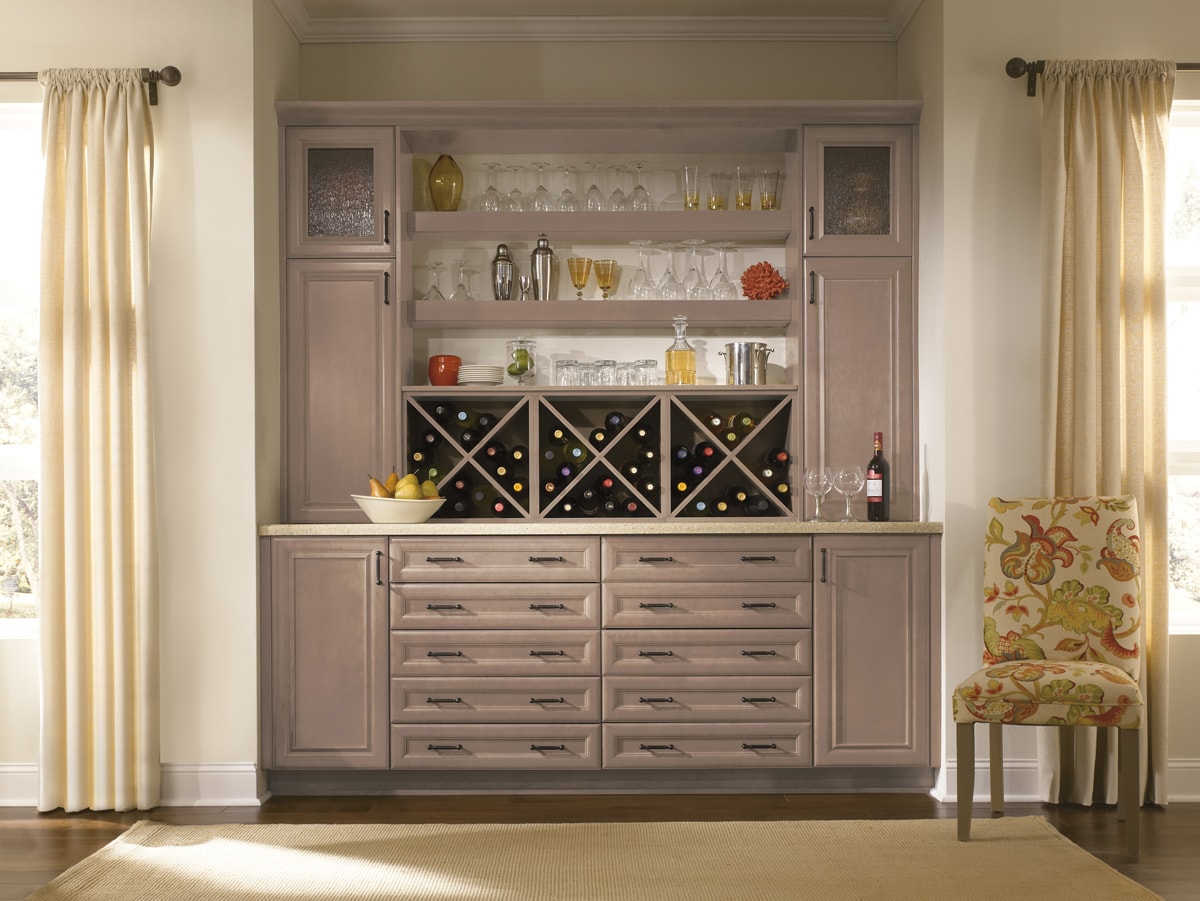 Beige cabinets with glass panels, open shelving and wine racks.