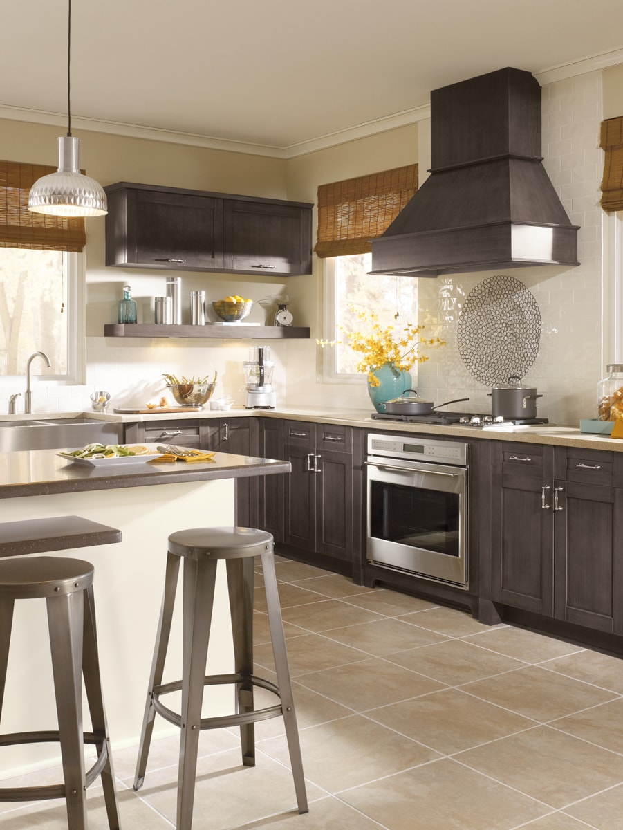 Dark grey cabinets paired with matching hoodfan.