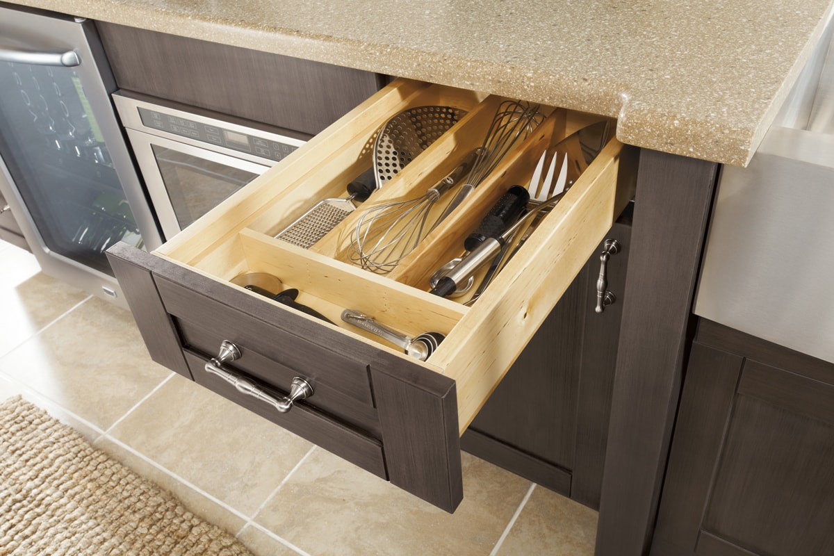 Thoughtful built-ins can help prevent a crowded utensil drawer.