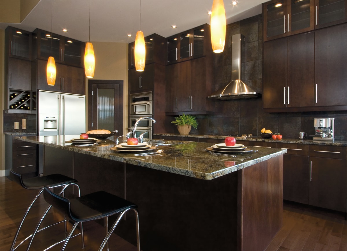 Rich warm dark brown kitchen and cabinets.