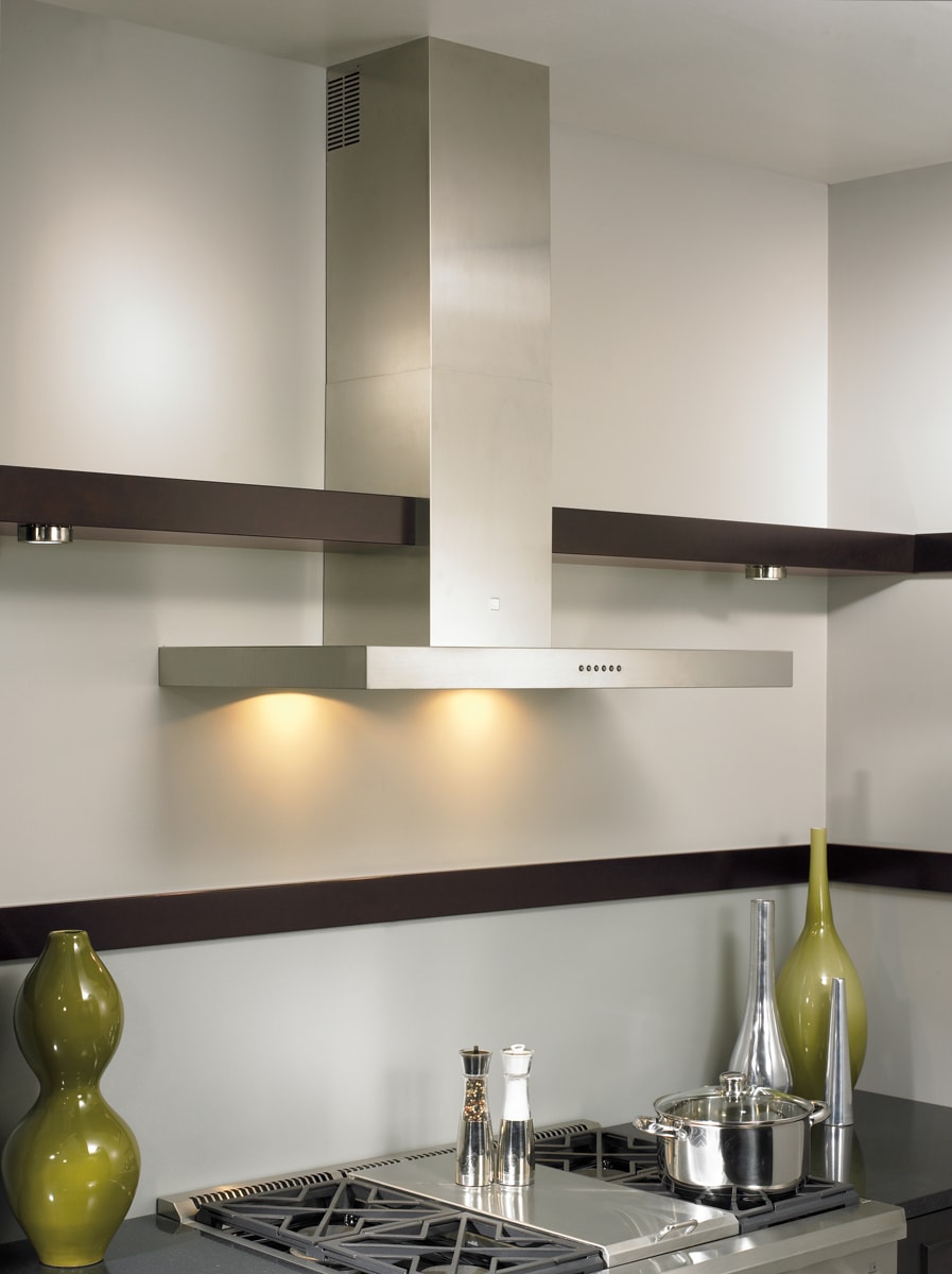 Contemporary style kitchen with a sleek silver hoodfan and dark brown floating shelves.