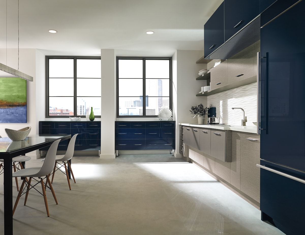 Navy blue cabinets in a neutral-toned Contemporary kitchen.