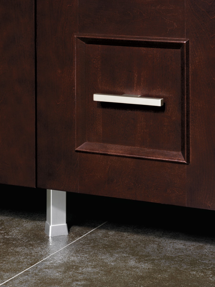 Square dark brown cabinet with a stainless handle.